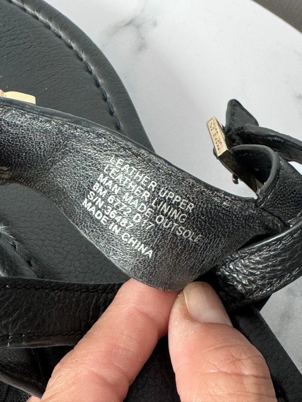 Tory Burch Black Leather Logo Thong Sandal with Gold Emblem